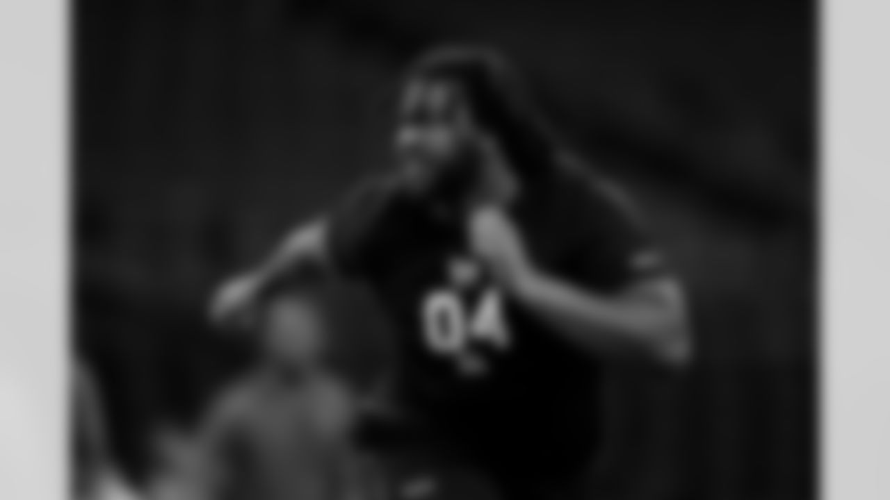 Michigan defensive lineman Rayshaun Benny (04) participates in a drill during the 2026 NFL Scouting Combine on Thursday, February 26, 2026 in Indianapolis, Indiana. (Cooper Neill/NFL)