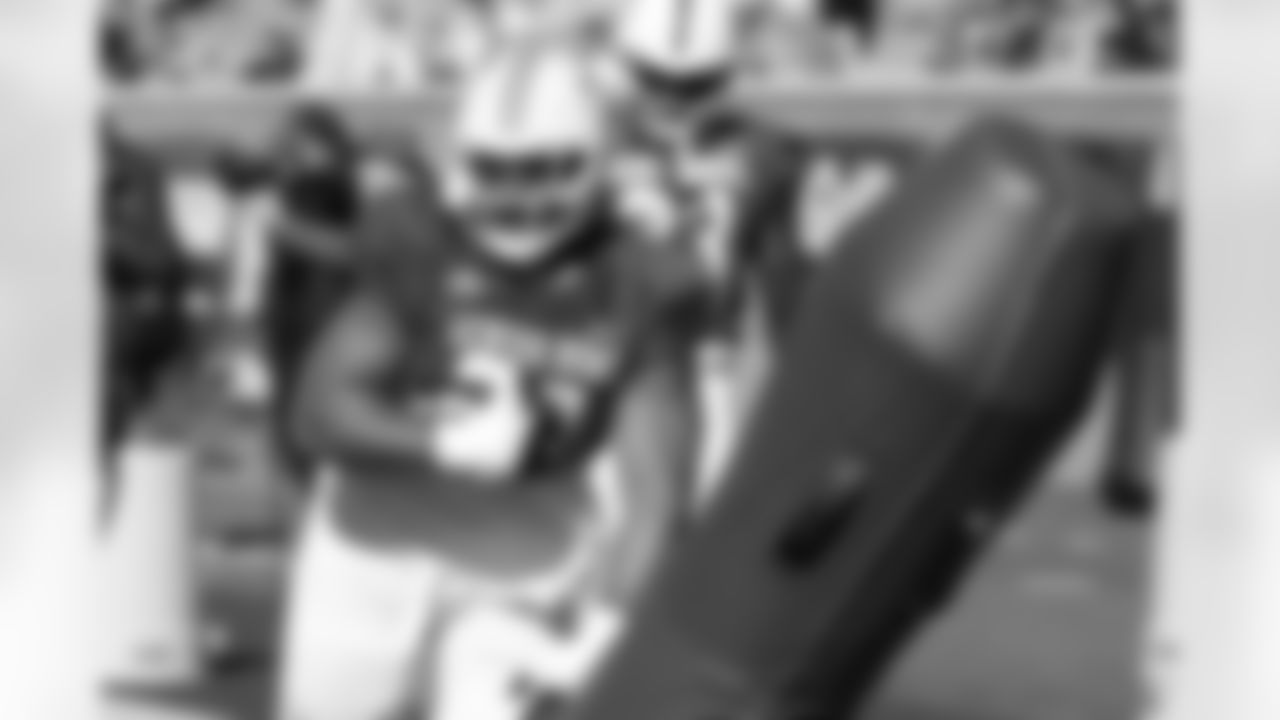 National Team defensive tackle Bryson Eason (20), of Tennessee, runs through drills during practice for the Senior Bowl NCAA college football game Wednesday, Jan. 28, 2026, in Mobile, Ala. (AP Photo/Butch Dill)