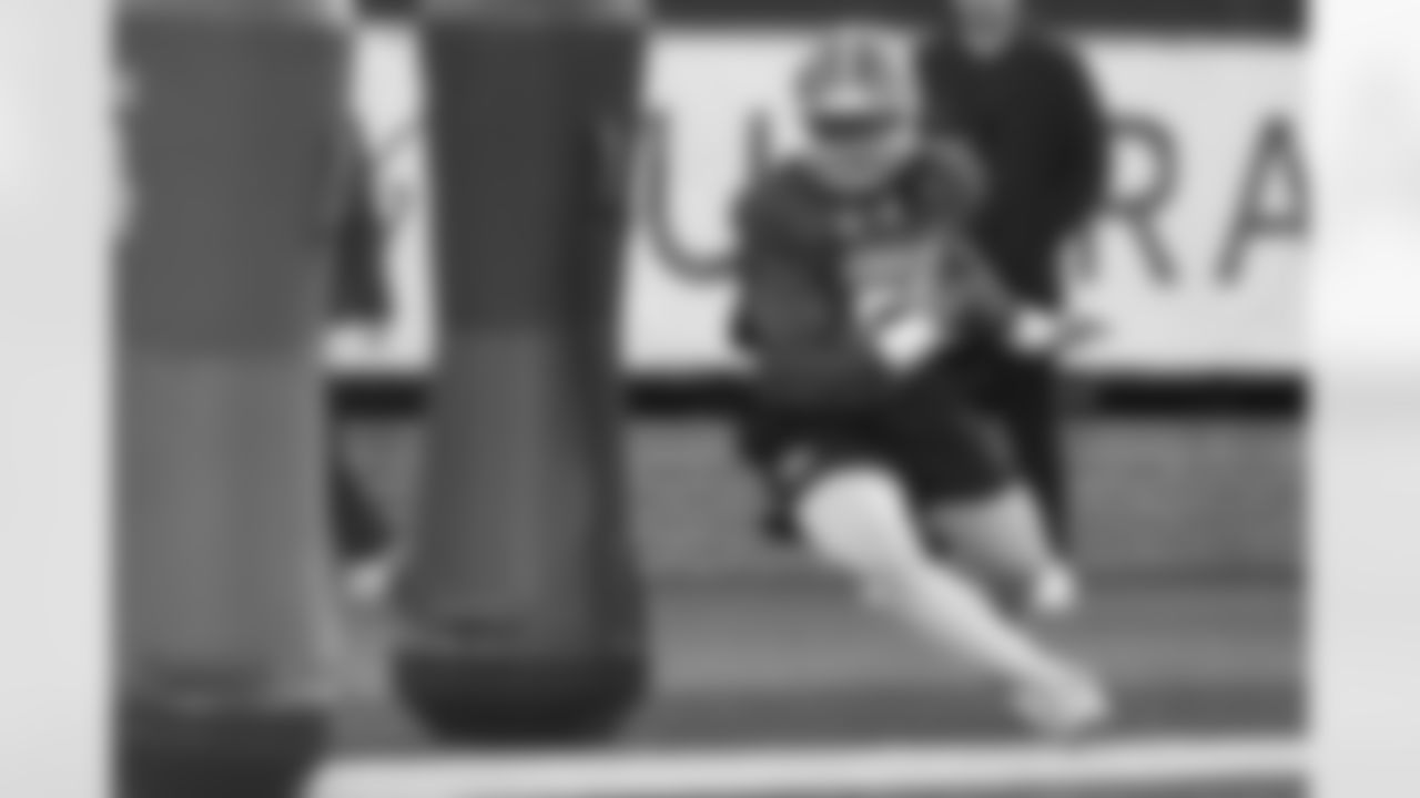 American Team defensive lineman Gabe Jacas (52), of Illinois, runs through drills during practice for the Senior Bowl NCAA college football game Tuesday, Jan. 27, 2026, in Mobile, Ala. (AP Photo/Butch Dill)