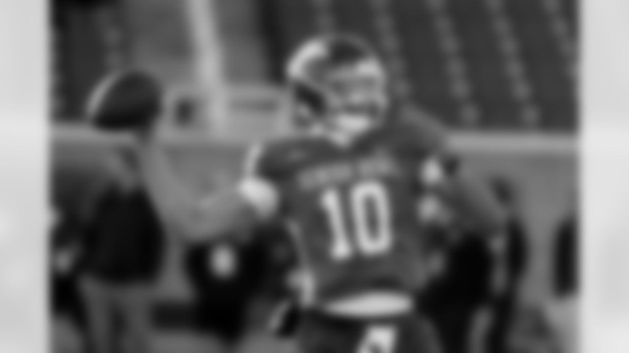 American Team quarterback Taylen Green (10), of Arkansas runs through drills during practice for the Senior Bowl NCAA college football game Tuesday, Jan. 27, 2026, in Mobile, Ala. (AP Photo/Butch Dill)