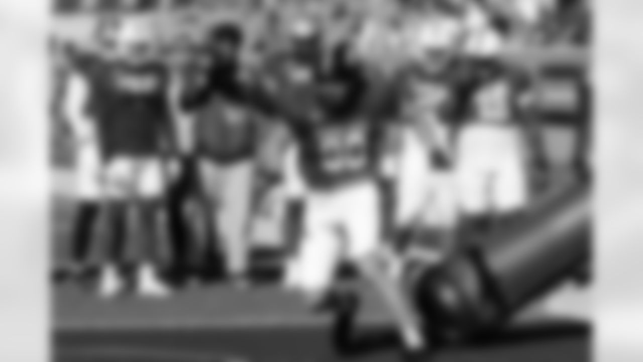 National Team defensive end Max Llewellyn (90), of Iowa, runs through drills during practice for the Senior Bowl NCAA college football game Wednesday, Jan. 28, 2026, in Mobile, Ala. (AP Photo/Butch Dill)