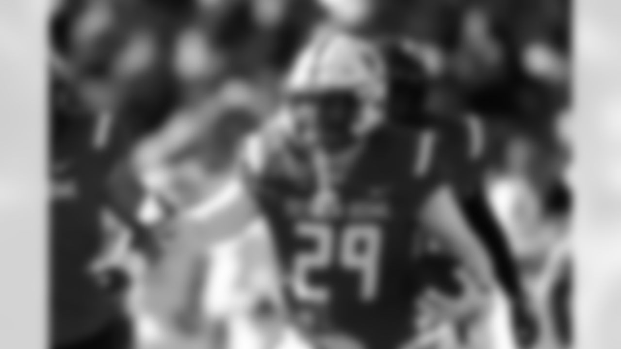 National Team safety Deshon Singleton (29), of Nebraska, celebrates after an interception during the first half of the Senior Bowl NCAA college football game Saturday, Jan. 31, 2026, in Mobile, Ala. (AP Photo/Butch Dill)