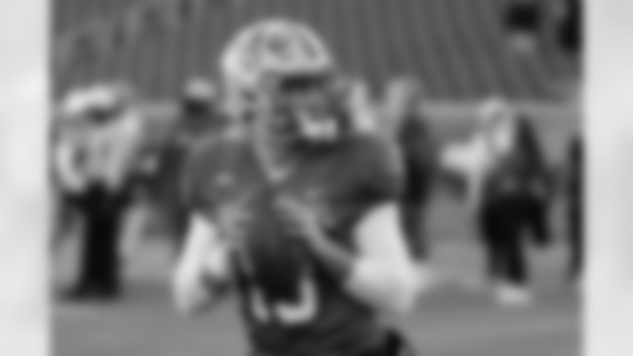 American Team quarterback Garrett Nussmeier (13), of LSU, runs through drills during practice for the Senior Bowl NCAA college football game Tuesday, Jan. 27, 2026, in Mobile, Ala. (AP Photo/Butch Dill)