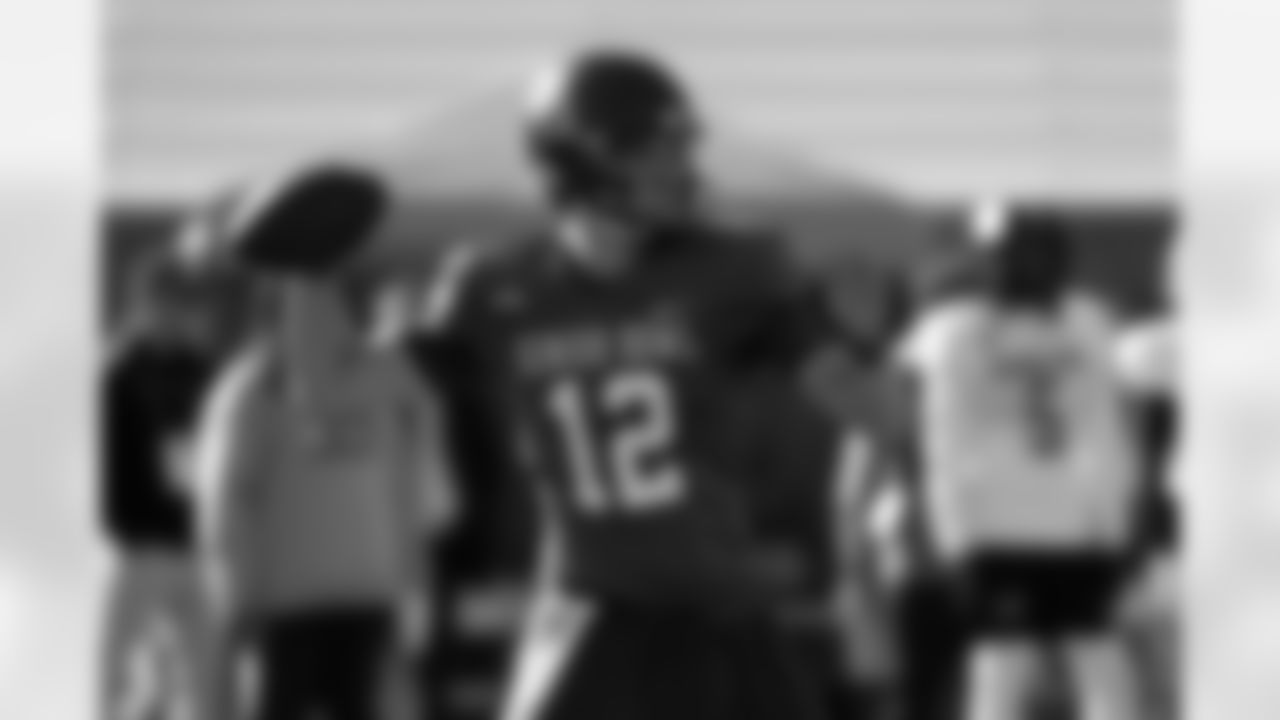 National Team quarterback Sawyer Robertson (12), of Baylor, runs through drills during practice for the Senior Bowl NCAA college football game Tuesday, Jan. 27, 2026, in Mobile, Ala. (AP Photo/Butch Dill)