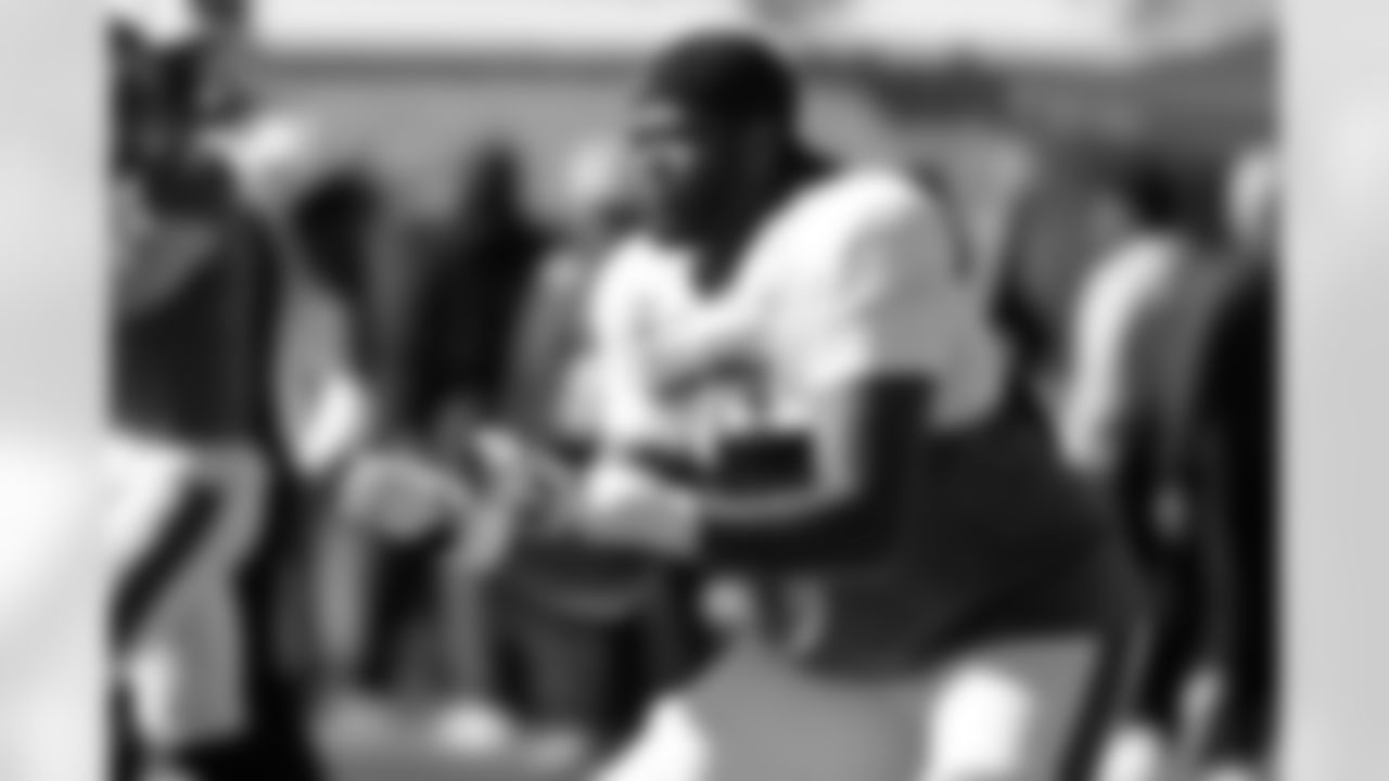 National Team offensive lineman Dametrious Crownover (78), of Texas A M, runs through drills during practice for the Senior Bowl NCAA college football game Wednesday, Jan. 28, 2026, in Mobile, Ala. (AP Photo/Butch Dill)