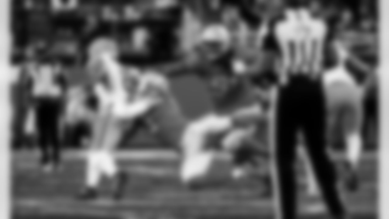 Detroit Lions edge rusher Aidan Hutchinson (97) and Detroit Lions defensive lineman Tyleik Williams (91) during an NFL football game against the Green Bay Packers on Thursday, Nov. 27, 2025 in Detroit. (Jeff Nguyen/Detroit Lions via AP)