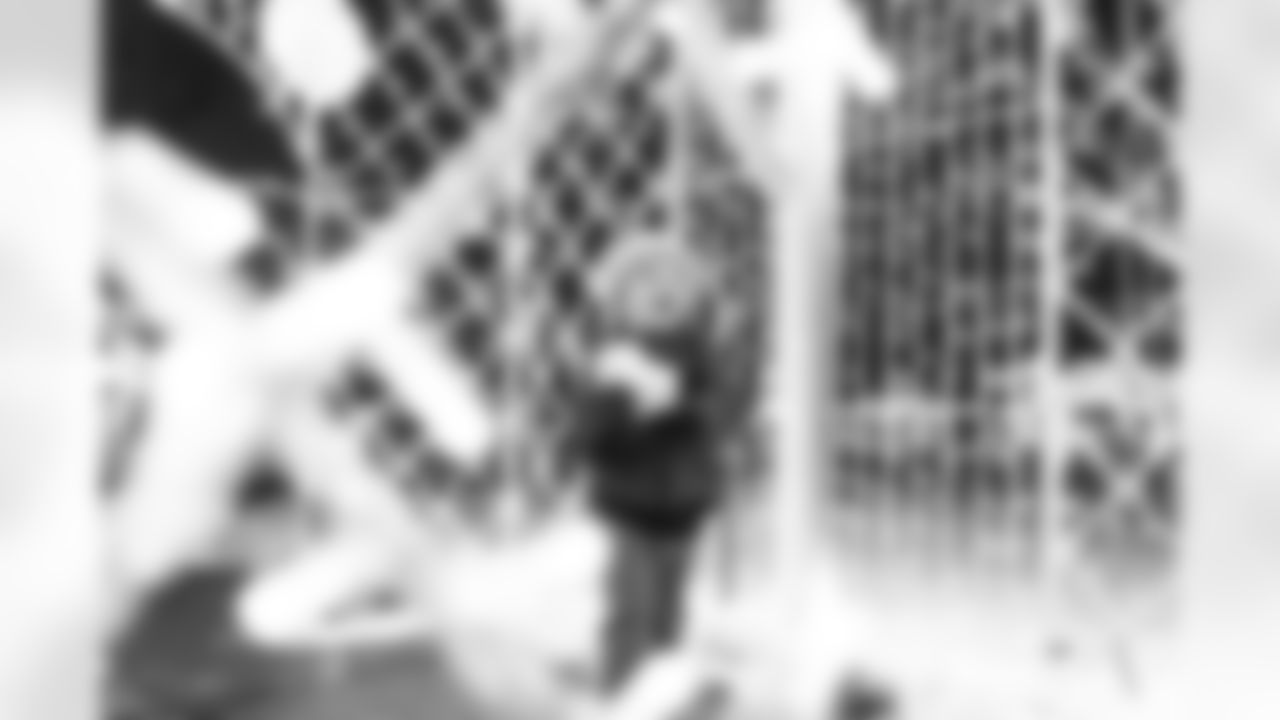 A Cub Club member with a ball of snow during the Cub Club Wild Lights event at the Detroit Zoo on Dec. 10, 2025 in Royal Oak, Mich. (Stephanie VanWagoner/Detroit Lions)