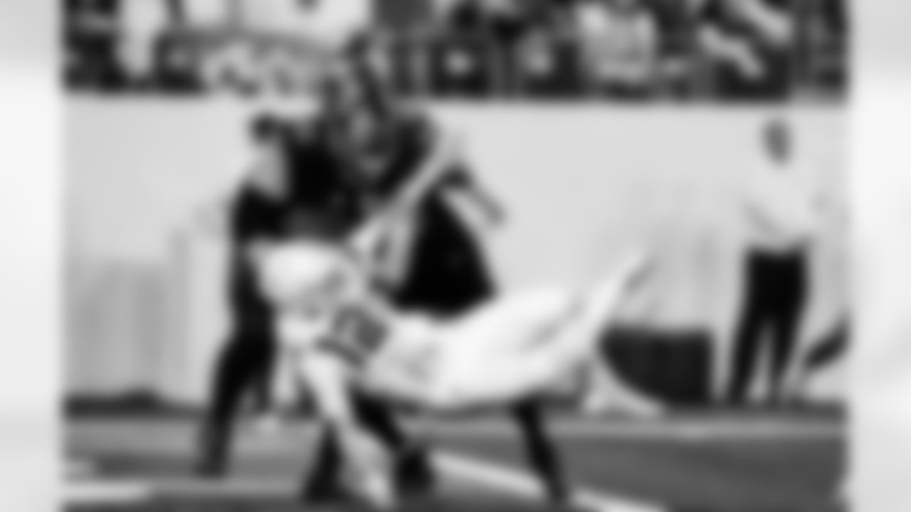 Detroit Lions defensive lineman Roy Lopez (51) and Detroit Lions edge rusher Al-Quadin Muhammad (96) during an NFL football game against the Minnesota Vikings on Thursday, Dec. 25, 2025 in Minneapolis. (Jeff Nguyen/Detroit Lions via AP)