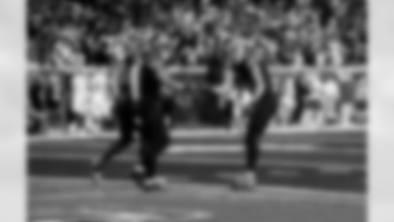 Detroit Lions running back Jahmyr Gibbs (0) and Detroit Lions wide receiver Amon-Ra St. Brown (14) celebrate after a touchdown during an NFL football game against the New York Giants on Sunday, Nov. 23, 2025 in Detroit. (Jeff Nguyen/Detroit Lions via AP)