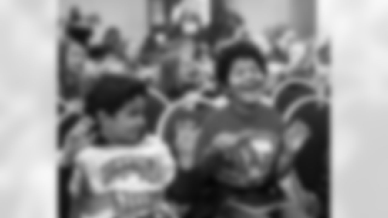 Students raising their hands during a talk with Author Jonathan Rand during the One Pride Literacy Fest at Ford Field on Oct. 28, 2025 in Detroit. (Steven Stark/Detroit Lions)