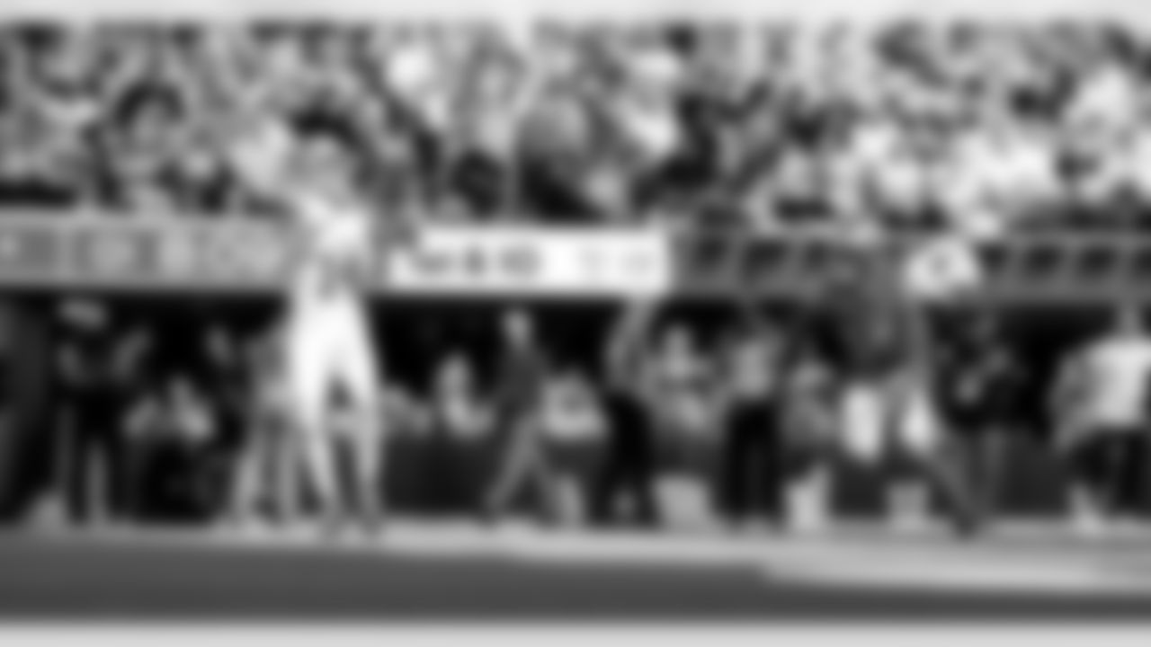 Detroit Lions wide receiver Amon-Ra St. Brown (14) scores a touchdown during an NFL football game against the Los Angeles Rams on Sunday, Dec. 14, 2025 in Inglewood, Calif. (Jeff Nguyen/Detroit Lions via AP)