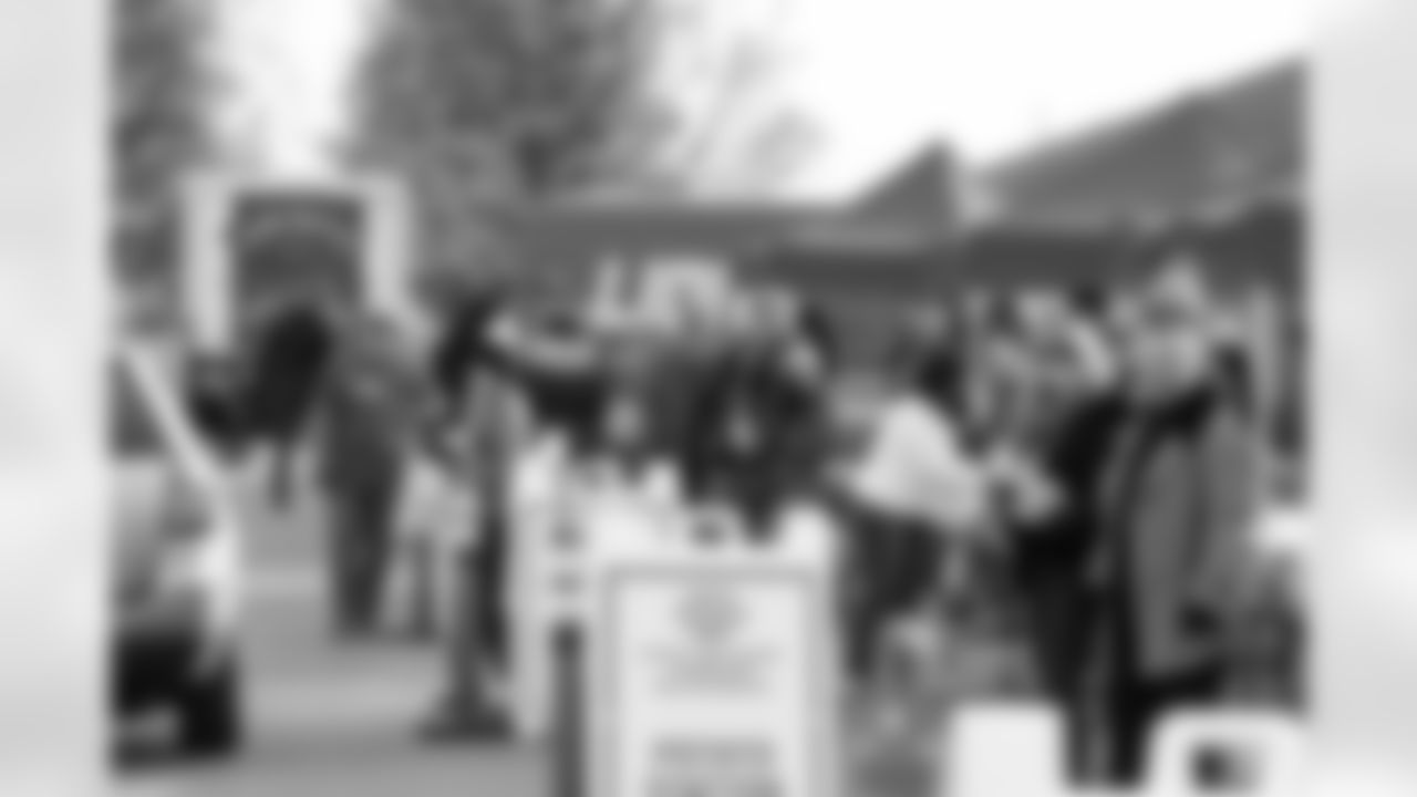 Lions staff and volunteers distribute meals during a Thanksgiving meal distribution event at the Detroit Lions Academy on Nov. 19, 2025 in Detroit. (Carl Jones II/Detroit Lions)