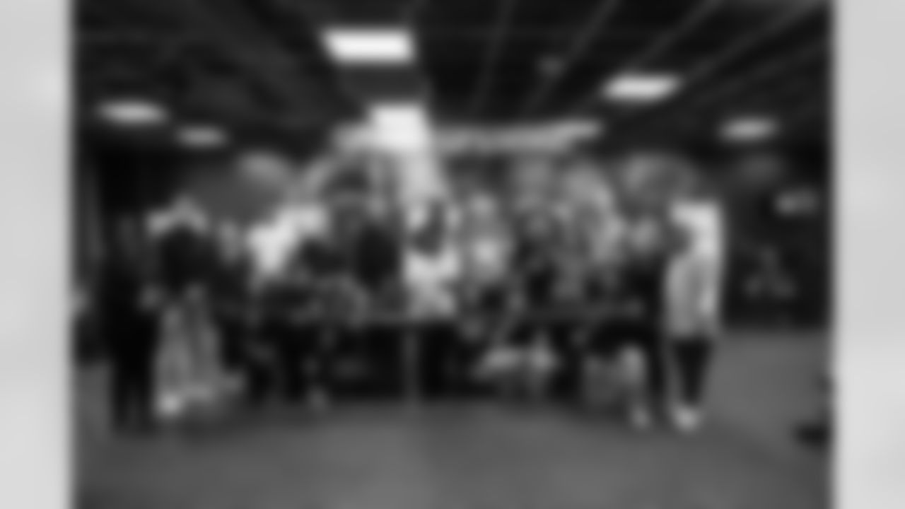 Lions Legend Alex Lewis (59), Lions Legend Eric Stocz (82), DLA Principal Ms. King, Detroit Lions Mascot Roary, Detroit Lions Vice President of Detroit Lions Foundation and Community Relations Roxanne Caine, Detroit Lions Foundation Program Officer Terrance Thomas and DLA staff and students during the UDIM & Planet Fitness Health and Wellness room reveal during a Count Day activation event at Detroit Lions Academy on Feb. 11, 2026 in Detroit. (Carl Jones II/Detroit Lions)