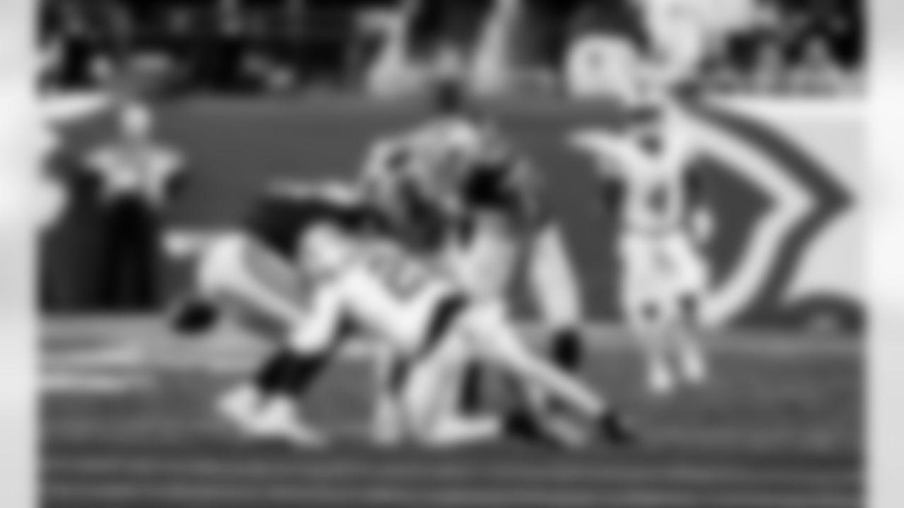 Detroit Lions linebacker Jack Campbell (46) forces a fumble during an NFL football game against the Dallas Cowboys on Thursday, Dec. 4, 2025 in Detroit. (Jeff Nguyen/Detroit Lions via AP)