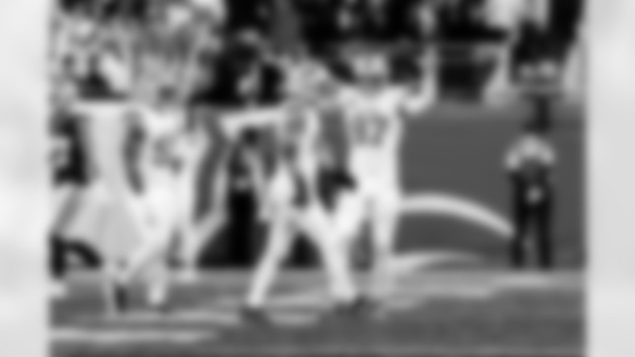 Detroit Lions edge rusher Al-Quadin Muhammad (96) and Detroit Lions edge rusher Aidan Hutchinson (97) during an NFL football game against the Dallas Cowboys on Thursday, Dec. 4, 2025 in Detroit. (Jeff Nguyen/Detroit Lions via AP)