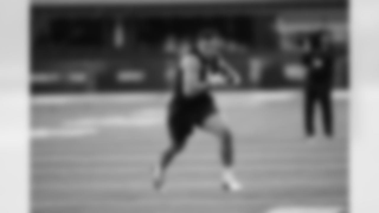 BYU linebacker Jack Kelly (14) runs a drill at the NFL football scouting combine in Indianapolis, Thursday, Feb. 26, 2026. (AP Photo/Julio Cortez)