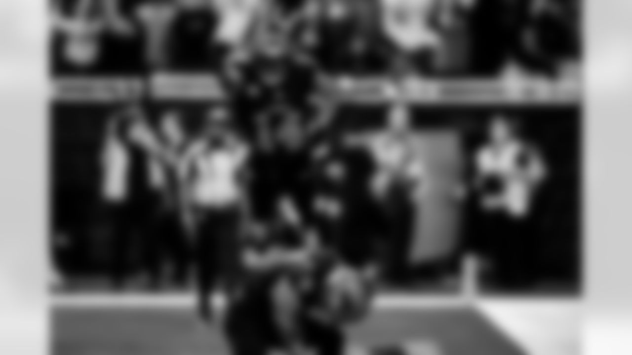 Detroit Lions wide receiver Amon-Ra St. Brown (14) and Detroit Lions running back Jahmyr Gibbs (0) celebrate after a touchdown during an NFL football game against the Tampa Bay Buccaneers on Monday, Oct. 20, 2025 in Detroit. (Jeff Nguyen/Detroit Lions via AP)