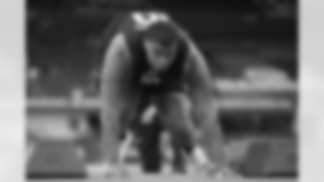 Minnesota defensive lineman Deven Eastern (10) runs a drill at the NFL football scouting combine in Indianapolis, Thursday, Feb. 26, 2026. (AP Photo/Michael Conroy)