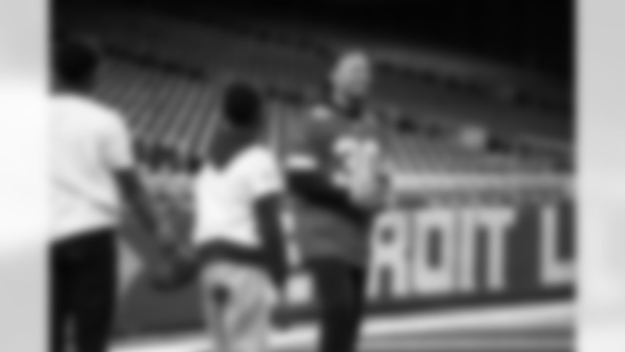 Detroit Lions cornerback Khalil Dorsey (30) interacting with participants during the Inspire Change Football Clinic at Ford Field on Dec. 9, 2025 in Detroit. (Izzy Rincon/Detroit Lions)