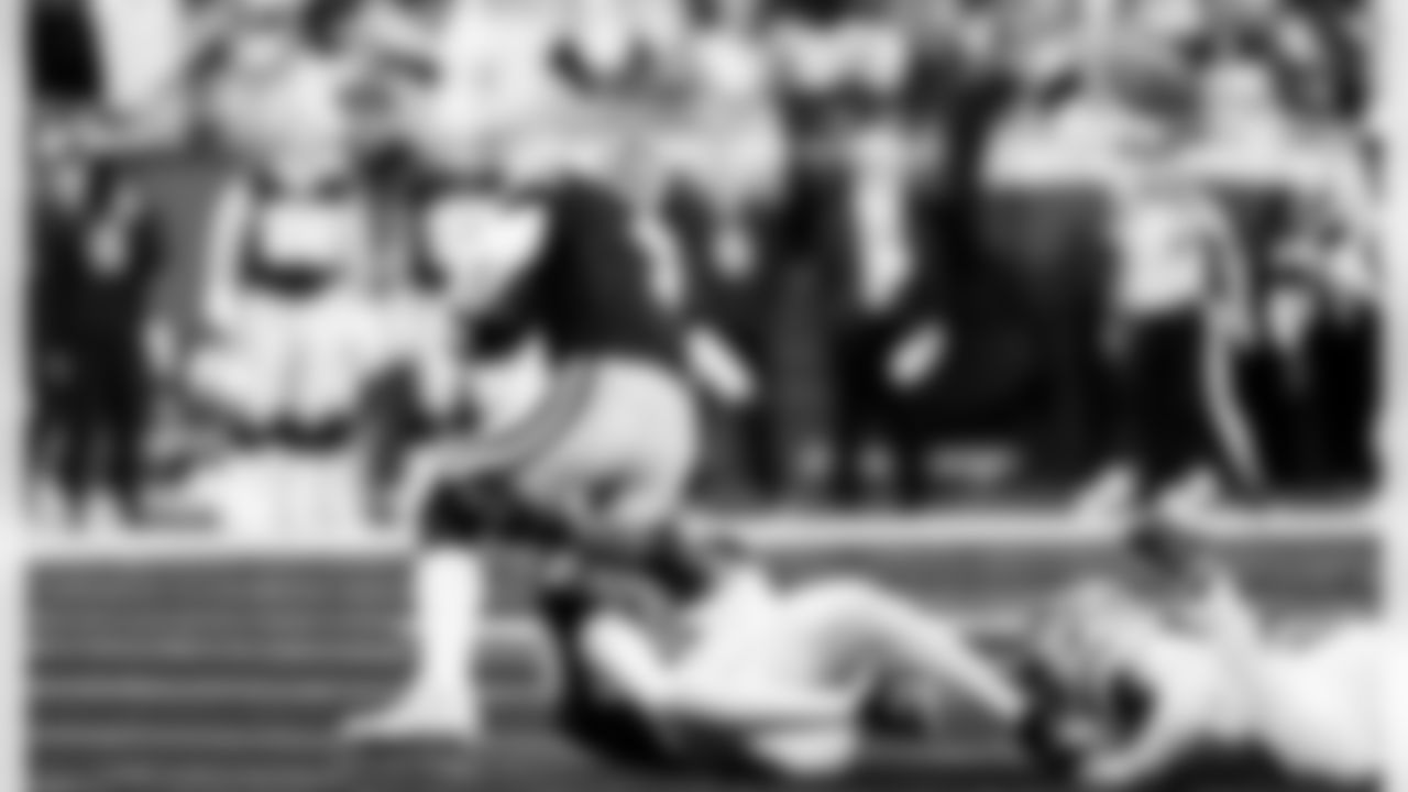 Detroit Lions edge rusher Al-Quadin Muhammad (96) sacks Dallas Cowboys quarterback Dak Prescott (4) during an NFL football game against the Dallas Cowboys on Thursday, Dec. 4, 2025 in Detroit. (Jeff Nguyen/Detroit Lions via AP)