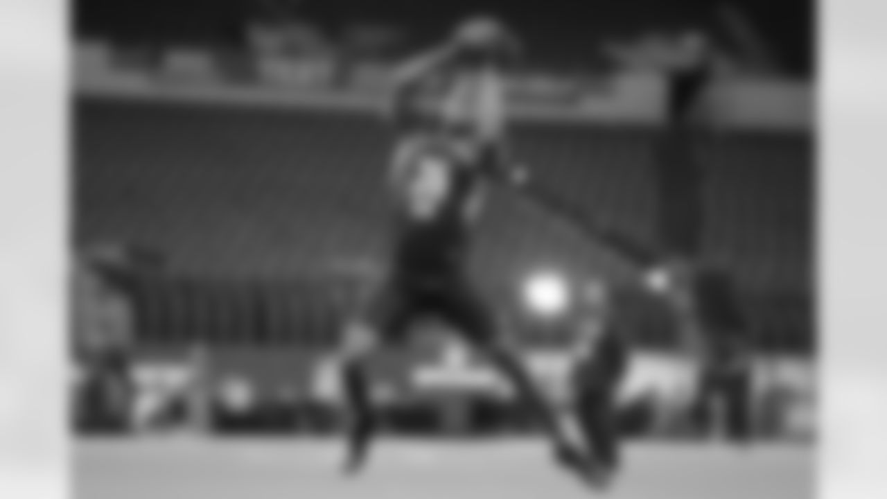 Temple defensive back Rock Ya-Sin runs a drill at the NFL football scouting combine in Indianapolis, Monday, March 4, 2019. (AP Photo/Michael Conroy)