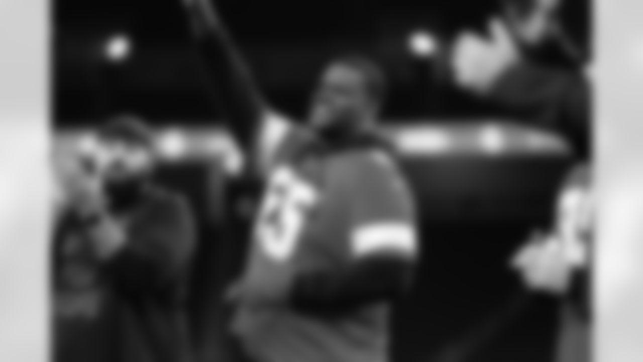 Lions Legend Martell Webb waving to participants during the Inspire Change Football Clinic at Ford Field on Dec. 9, 2025 in Detroit. (Izzy Rincon/Detroit Lions)