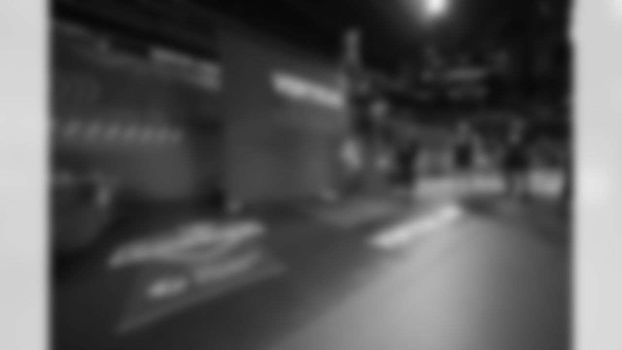 Central Florida defensive lineman Malachi Lawrence (48) runs a drill at the NFL football scouting combine in Indianapolis, Thursday, Feb. 26, 2026. (AP Photo/Julio Cortez)