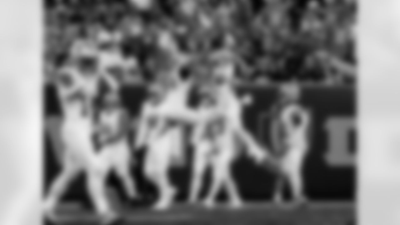 Detroit Lions linebacker Alex Anzalone (34) and Detroit Lions linebacker Derrick Barnes (55) celebrate after an interception during an NFL football game against the Cincinnati Bengals on Sunday, Oct. 5, 2025 in Cincinnati. (Jeff Nguyen/Detroit Lions via AP)