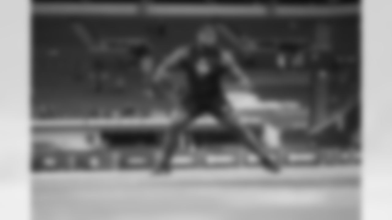 Georgia offensive lineman Micah Morris (36) runs a drill at the NFL football scouting combine in Indianapolis, Sunday, March 1, 2026. (AP Photo/Michael Conroy)