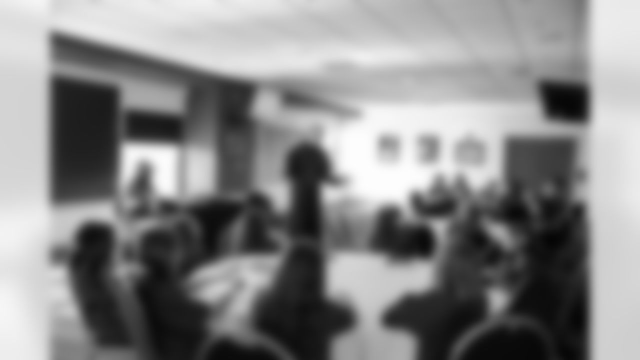 Author Jonathan Rand telling ghost stories to the students from Allendale Evergreen Elementary and Lions Legend Scott Conover (76) during the One Pride Literacy Fest at Ford Field on Oct. 28, 2025 in Detroit. (Steven Stark/Detroit Lions)