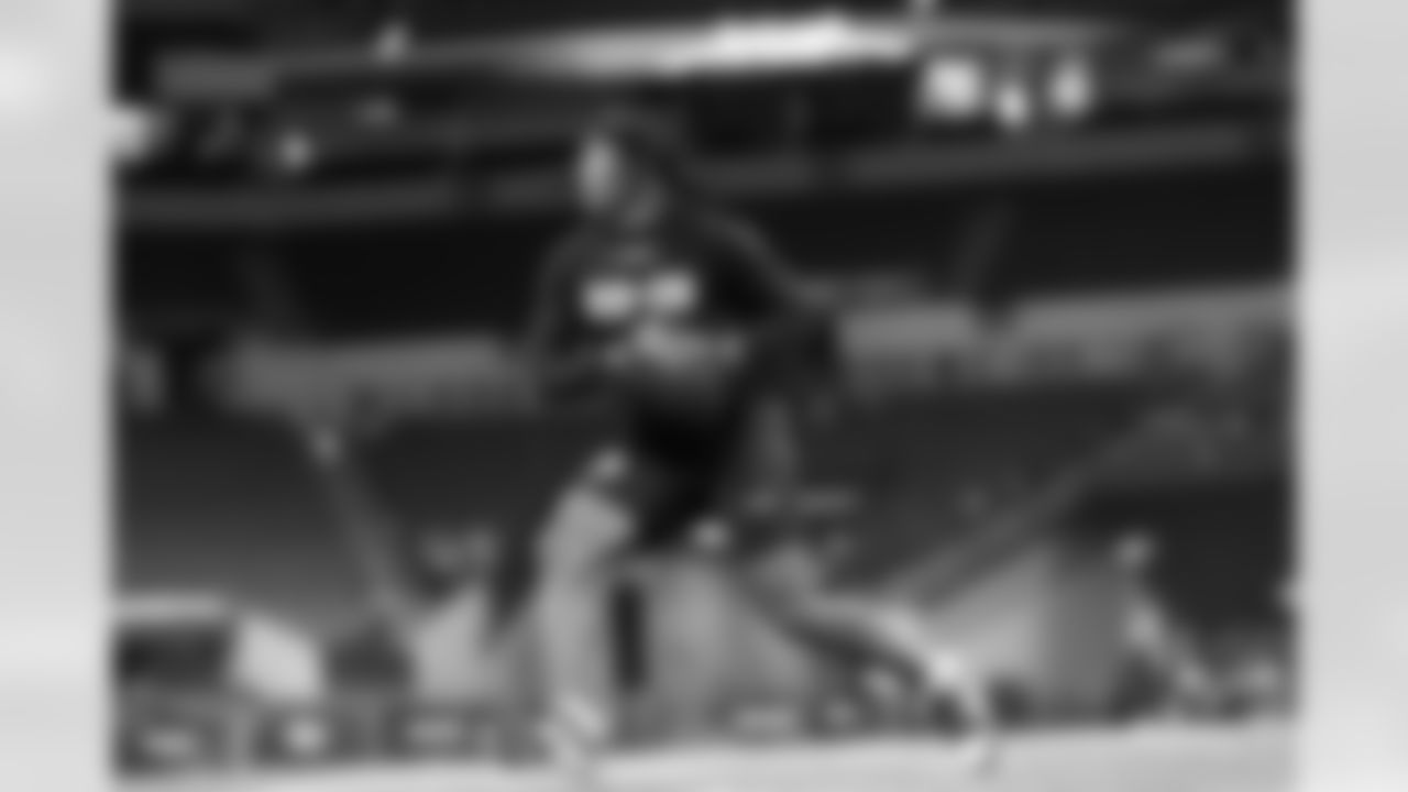 Alabama running back Jahmyr Gibbs runs a drill at the NFL football scouting combine in Indianapolis, Sunday, March 5, 2023. (AP Photo/Darron Cummings)