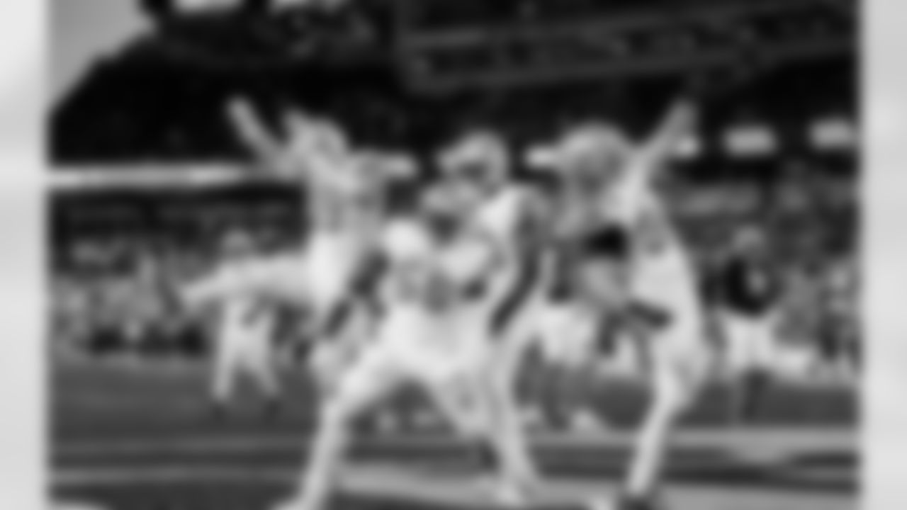 Detroit Lions edge rusher Aidan Hutchinson (97), Detroit Lions linebacker Derrick Barnes (55), Detroit Lions edge rusher Al-Quadin Muhammad (96), and Detroit Lions linebacker Alex Anzalone (34) celebrate after a safety during an NFL football game against the Cincinnati Bengals on Sunday, Oct. 5, 2025 in Cincinnati. (Jeff Nguyen/Detroit Lions via AP)