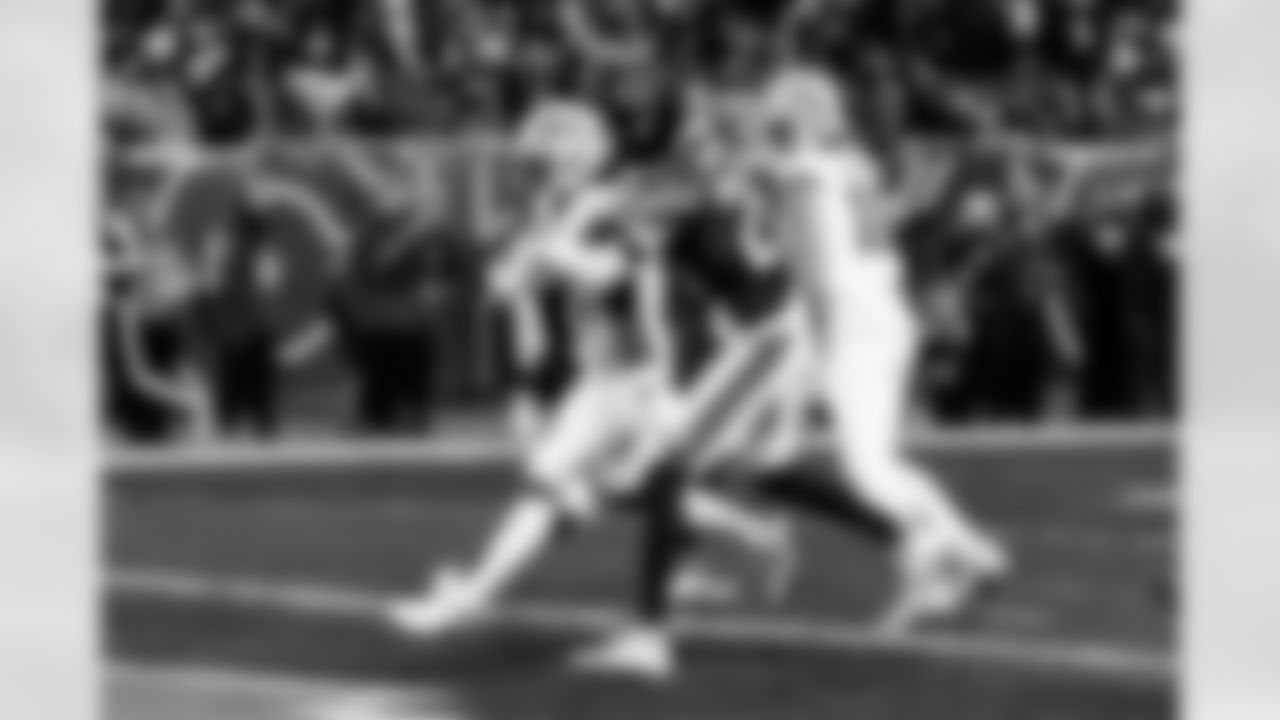 Detroit Lions running back Jahmyr Gibbs (0) scores a touchdown during an NFL football game against the Chicago Bears on Sunday, Jan. 4, 2026 in Chicago. (Jeff Nguyen/Detroit Lions via AP)