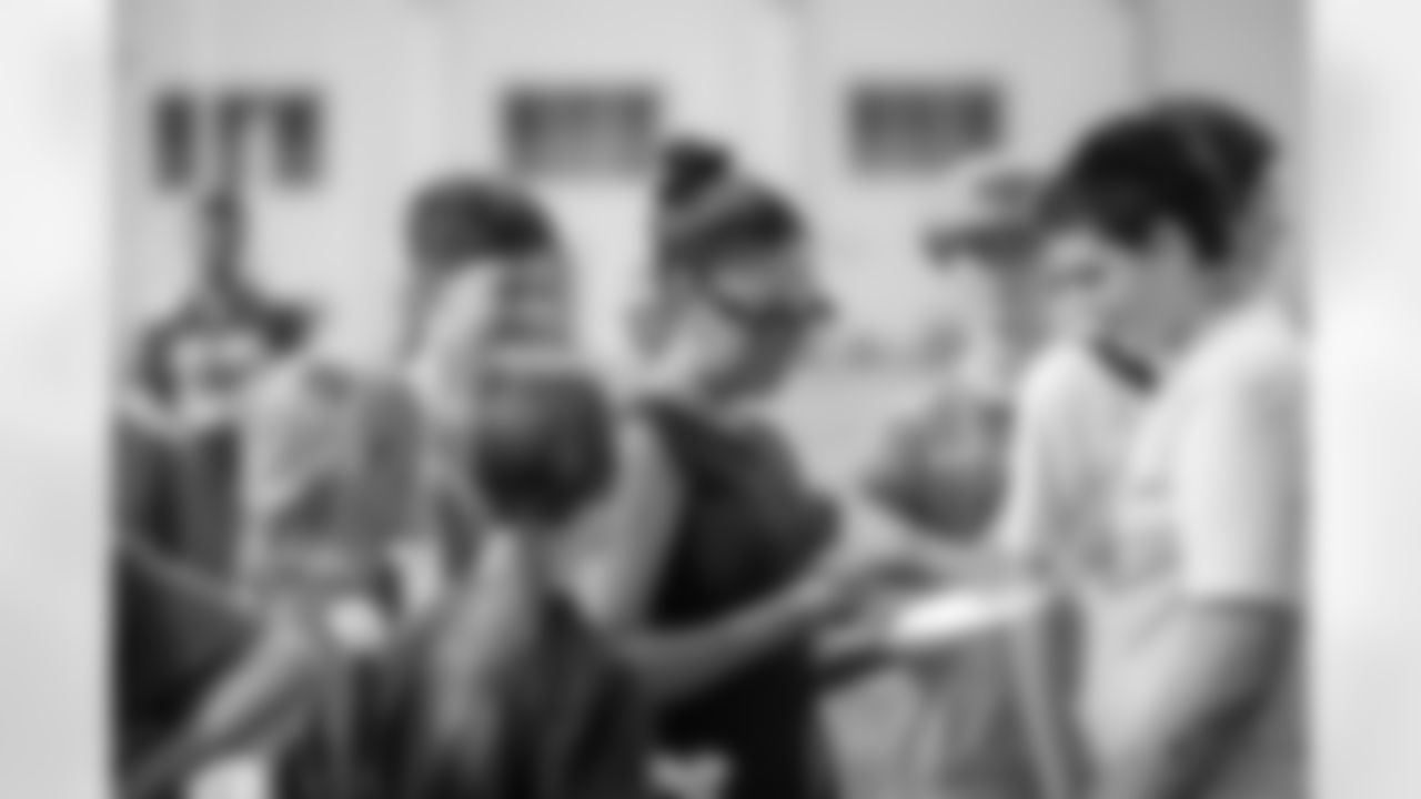 Students of the East Jordan Shoe Club tour the practice field following a shoe design competition event at the Meijer Performance Center on Sept. 27, 2025 in Allen Park, Mich. (Carl Jones II/Detroit Lions via AP)