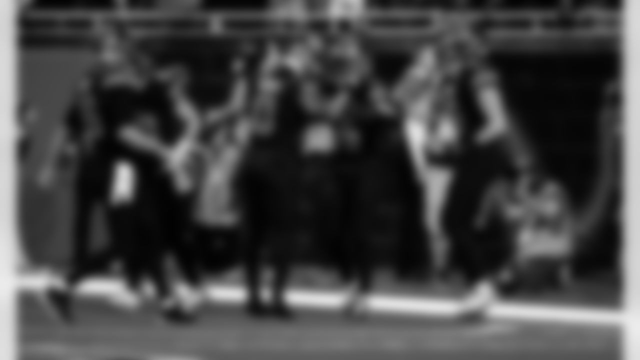 Detroit Lions running back Jahmyr Gibbs (0) and Detroit Lions wide receiver Amon-Ra St. Brown (14) celebrate after a touchdown during an NFL football game against the Tampa Bay Buccaneers on Monday, Oct. 20, 2025 in Detroit. (Jeff Nguyen/Detroit Lions via AP)