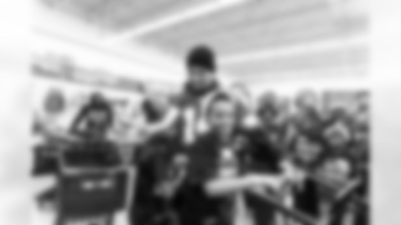 Detroit Lions wide receiver Amon-Ra St. Brown (14) during Shop with a Lion at Meijer on Dec. 8, 2025 in Detroit. (Stephanie VanWagoner/Detroit Lions)