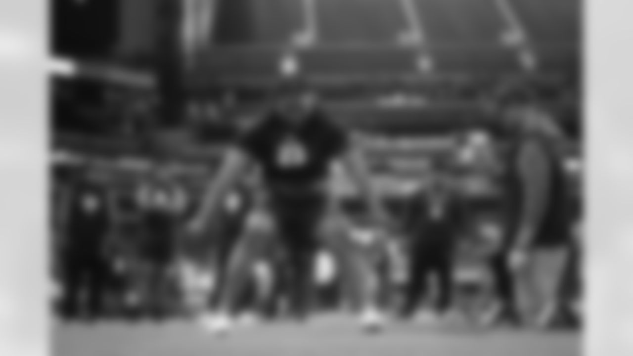 Texas A&M defensive lineman Tyler Onyedim (23) runs a drill at the NFL football scouting combine in Indianapolis, Thursday, Feb. 26, 2026. (AP Photo/Julio Cortez)