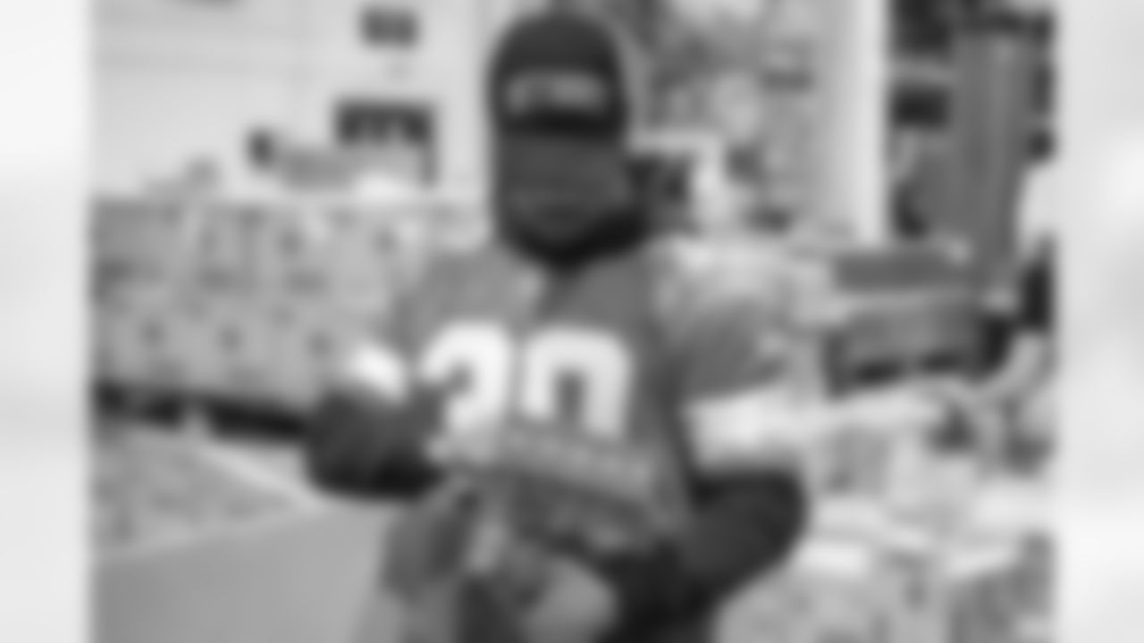 Detroit Lions cornerback Khalil Dorsey (30) during a Thanksgiving meal packing event at the Gleaners Community Food Bank in Taylor, MI on November 12, 2024. (Mike Ferdinande/Detroit Lions)
