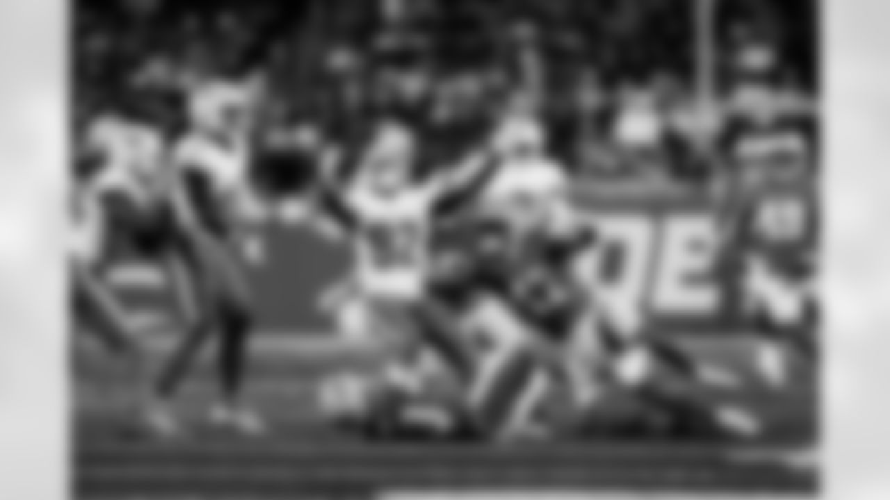Detroit Lions running back Sione Vaki (33) forces a fumble during an NFL football game against the Miami Dolphins, Saturday, August 16 in Detroit. (Jeff Nguyen/Detroit Lions via AP)