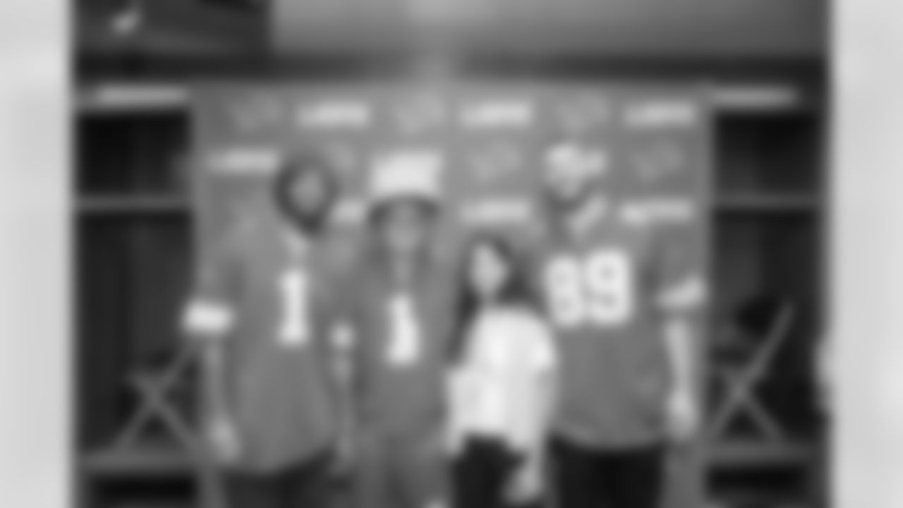 Detroit Lions wide receiver Jameson Williams (1) and Detroit Lions tight end Brock Wright (89) pose for a photo with fans during the Detroit Lions Draft Party at Ford Field on April 24, 2025 in Detroit. (Stephanie VanWagoner/Detroit Lions)