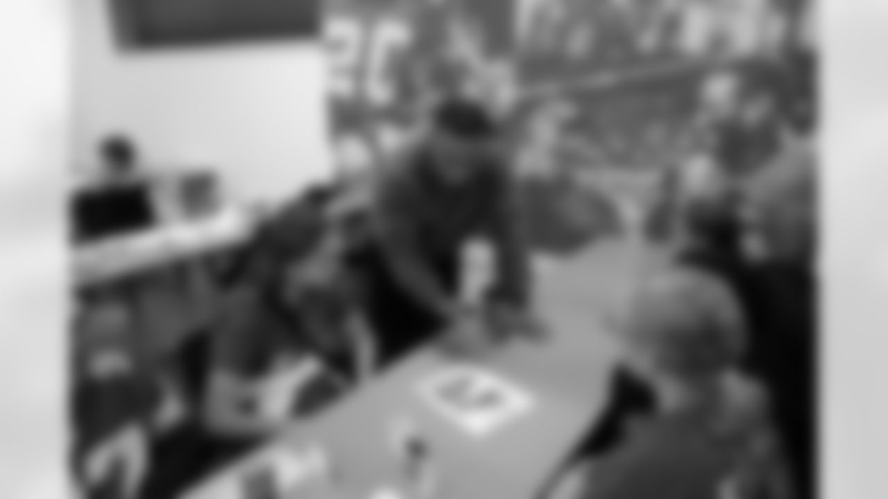 Detroit Lions wide receiver Amon-Ra St. Brown (14) meets with each design group during a shoe design competition event at the Meijer Performance Center on Sept. 27, 2025 in Allen Park, Mich. (Carl Jones II/Detroit Lions via AP)