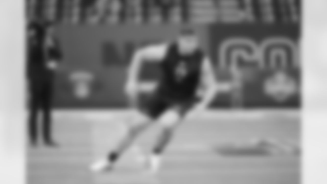Boise State offensive lineman Kage Casey (13) runs a drill at the NFL football scouting combine in Indianapolis, Sunday, March 1, 2026. (AP Photo/Michael Conroy)