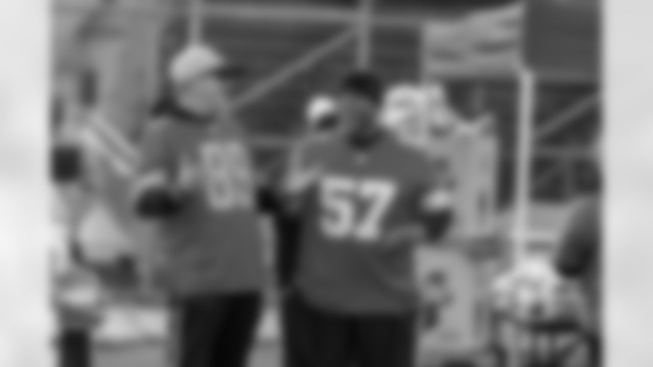 Lions Legend Jeff Chadwick (89) and Lions Legend Tim Walton (57) during a Thanksgiving meal distribution event at the Detroit Lions Academy on Nov. 19, 2025 in Detroit. (Carl Jones II/Detroit Lions)