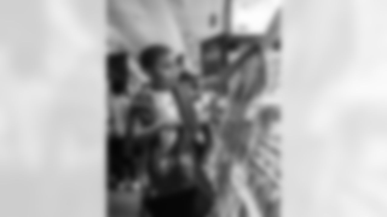 Students from Savage Elementary Trick or Treating at the UMCU Book Blitz station during the One Pride Literacy Fest at Ford Field on Oct. 28, 2025 in Detroit. (Steven Stark/Detroit Lions)