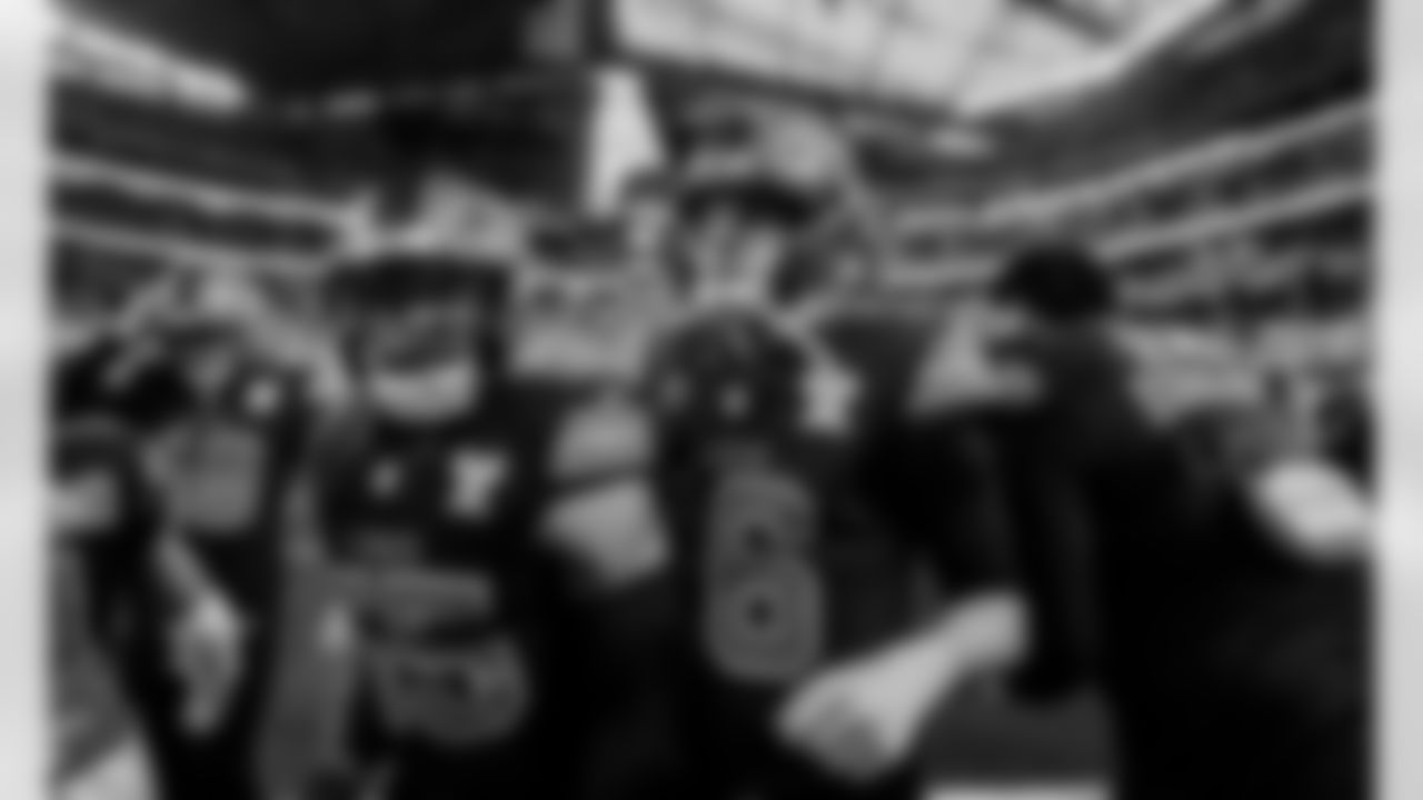 Detroit Lions linebacker Derrick Barnes (55) and Detroit Lions quarterback Jared Goff (16) before an NFL football game against the Minnesota Vikings on Thursday, Dec. 25, 2025 in Minneapolis. (Jeff Nguyen/Detroit Lions via AP)