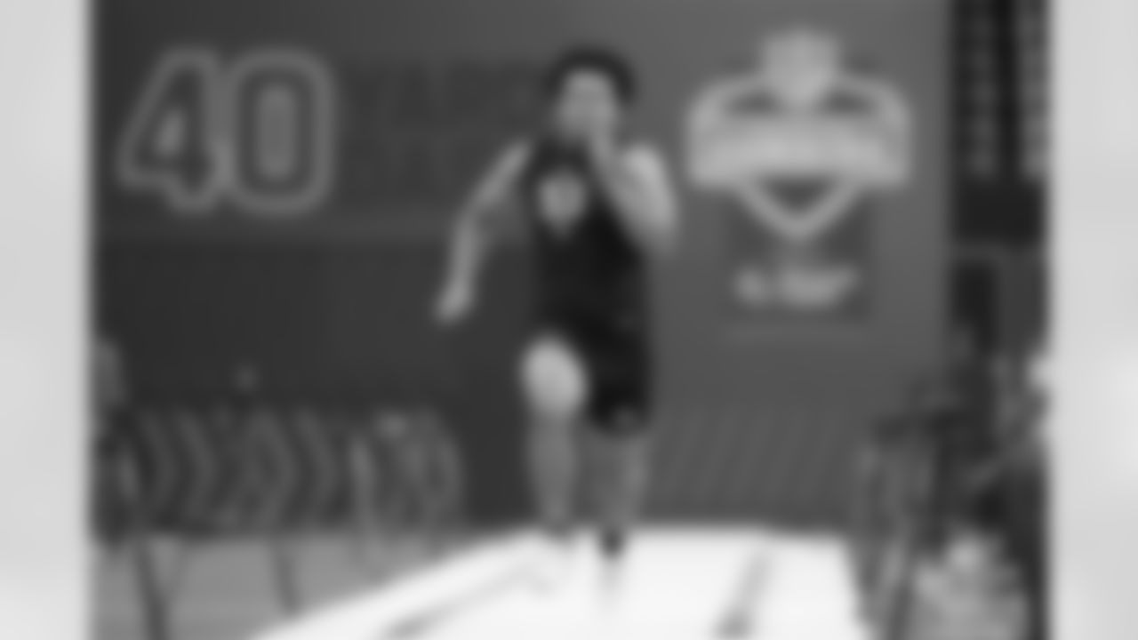 Texas defensive lineman Trey Moore (53) runs the 40-yard dash at the NFL football scouting combine in Indianapolis, Thursday, Feb. 26, 2026. (AP Photo/Julio Cortez)