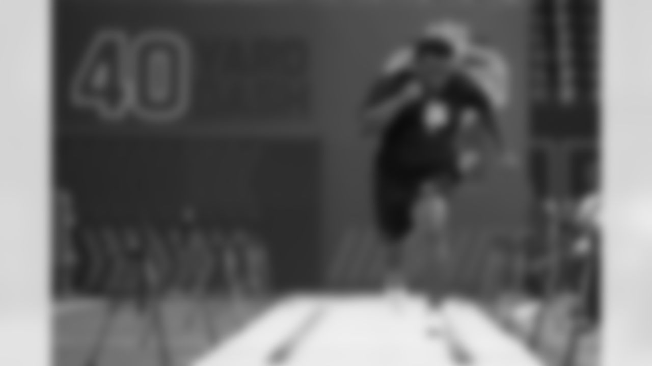 North Carolina State defensive lineman Brandon Cleveland (06) runs the 40-yard dash at the NFL football scouting combine in Indianapolis, Thursday, Feb. 26, 2026. (AP Photo/Michael Conroy)