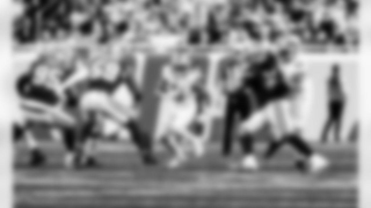 Detroit Lions running back Jahmyr Gibbs (0) and Detroit Lions tackle Taylor Decker (68) during an NFL football game against the Dallas Cowboys on Thursday, Dec. 4, 2025 in Detroit. (Jeff Nguyen/Detroit Lions via AP)