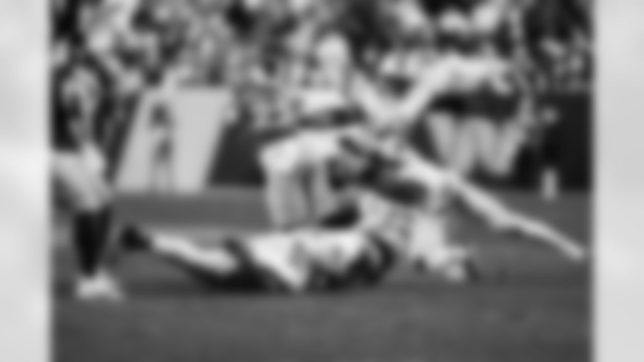 Detroit Lions defensive lineman Roy Lopez (51), Detroit Lions cornerback Nick Whiteside (38), and Detroit Lions edge rusher Al-Quadin Muhammad (96) during an NFL football game against the Washington Commanders on Sunday, Nov. 9, 2025 in Landover, Md. (Jeff Nguyen/Detroit Lions via AP)