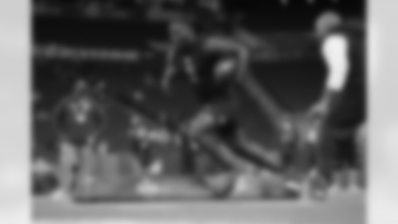 Notre Dame running back Jeremiyah Love (11) runs a drill at the NFL football scouting combine in Indianapolis, Saturday, Feb. 28, 2026. (AP Photo/Julio Cortez)